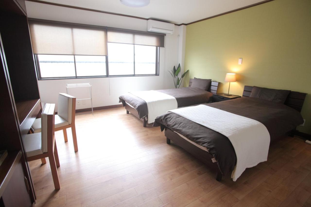 Guest House Futaba Osaka Bagian luar foto