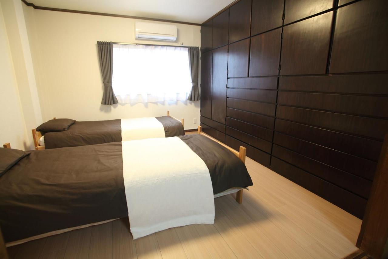Guest House Futaba Osaka Bagian luar foto